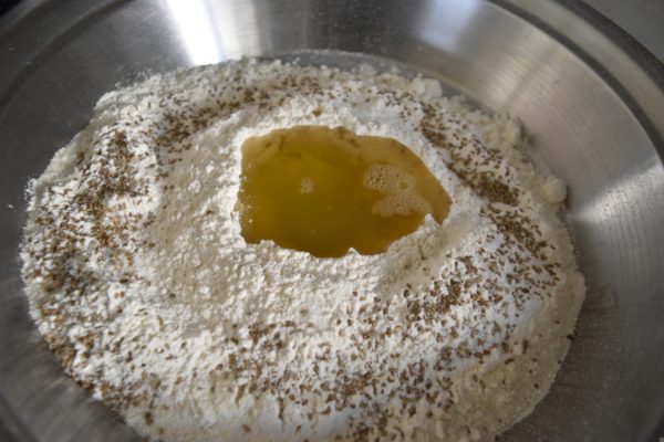 Maida Flour filled with Oil in between मैदे में तेल बीच में भरा हुआ 